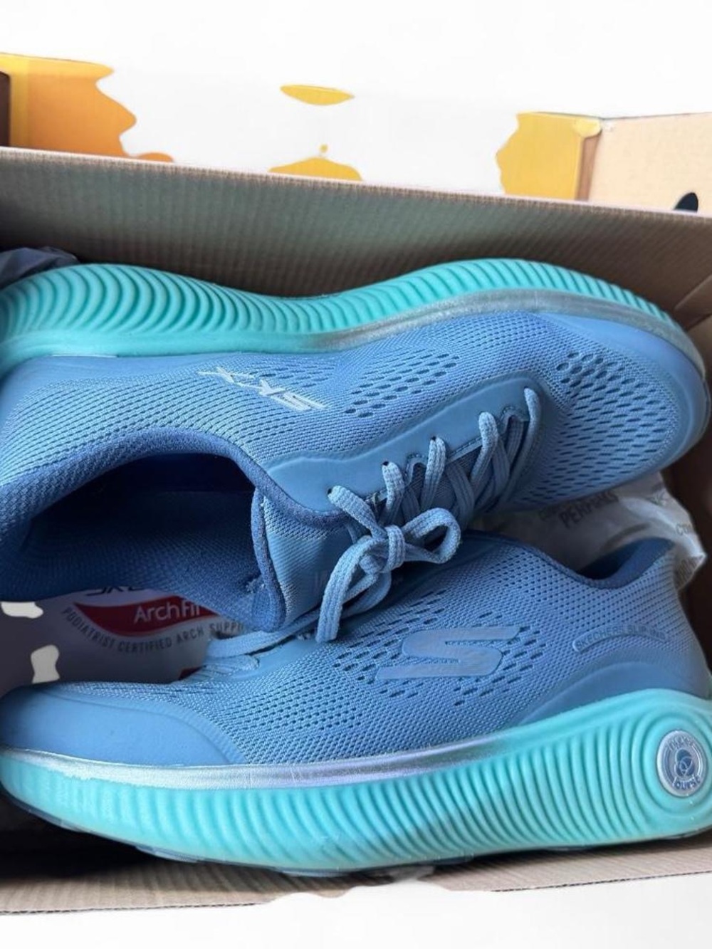 Skechers Women's Light Blue Athletic Sneakers with Turquoise Soles